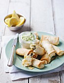 Spinach and feta cheese rolls with tzatziki