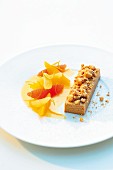 Marinated citrus fruits with caramel cream and crumble