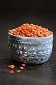 Red lentils in a silver bowl