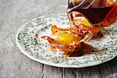 Egg in crispy Parma ham with maple syrup