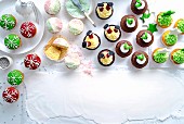 Various decorated colourful cupcakes for Christmas