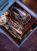 Old silver cutlery in drawer