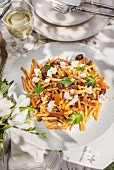 Pasta with fish, ricotta and olives