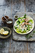 Trout avocado salad with dill and horseradish dressing