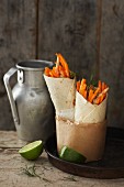 Carrot salad wraps with a cashew nut dressing