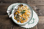 Pasta with butternut squash, feta cheese and sage