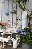 Old washing set in corner of garden decorated in vintage style