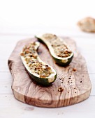 Stuffed grilled zucchini halves with sheep's cheese