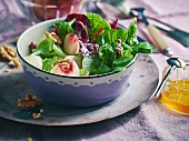Mixed leaf salad with vineyard peaches, walnuts and gorgonzola