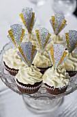 Cupcakes decorated with glittery Art Deco toppers