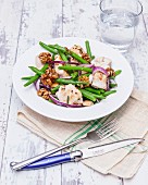 Salad with chicken, green beans and walnuts
