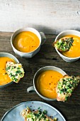 Pumpkin and papaya soup with grilled Camembert and coriander bread