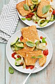 Breaded tofu with courgettes and tomatoes