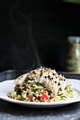 Vegetable couscous with spicy peppered fish