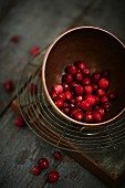Cranberries in a copper bowl