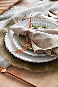Christmas place setting with cloth napkin and ribbon