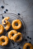 Blueberry and ricotta doughnuts with salted caramel and chocolate glaze