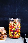 Salad with chickpeas, kidney beans and peppers in a jar