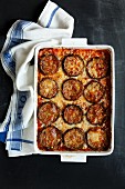 Aubergine bake with tomato sauce and melted cheese (seen from above)
