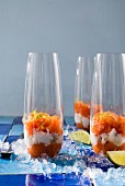 Layered desserts with papaya, coconut and lime