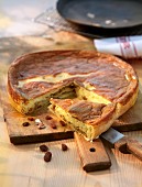 Swiss almond cake with sultanas, puff pastry, almonds and beaten egg white