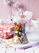 A mixture for nut muesli in a preserving jar as a gift