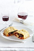 Vegetable pizza pockets with melted Edam cheese