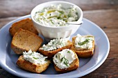 Grilled bread with a herb and cream cheese spread
