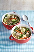 Vegetable soup with meat dumplings and pasta
