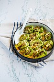 Stuffed, oven-baked courgette flowers