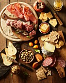 A supper of cold cuts, cheese, nuts and fruit