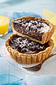 Exotic tartlets with dark chocolate cream and pineapple