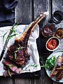 Barbecued tomahawk with tomato relish