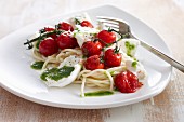 Spaghetti with oven-roasted tomatoes, mozzarella and basil sauce