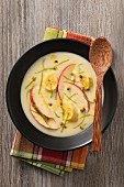 Sweet tapioca and coconut milk soup with bananas and apples