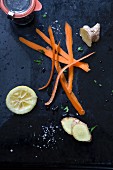 Carrot peelings, ginger and a juiced lemon