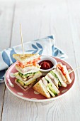 Club sandwiches with mackerel and vegetables