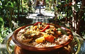 Moroccan-style couscous in a large terracotta dish