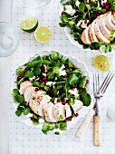 Lambs lettuce with chicken, pomegranate seeds and feta cheese