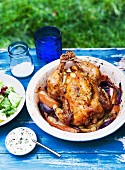 Roast chicken with onions and apple