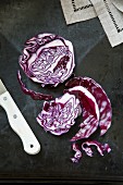Sliced red cabbage and a knife
