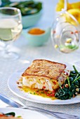 Cod with an almond crust and spinach for Easter
