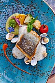 Hake with clams and vegetables