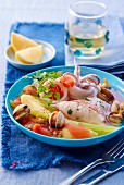 Pot au feu with fish and seafood