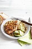 Chicken fillet with peanuts and cucumber salad (India)