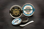Tins of caviar and a mother-of-pearl spoon