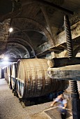 An old wine press in a wine cellar in Passopisciaro, Sicily, Italy