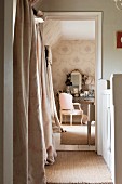 View from hallway to dressing table with Baroque armchair