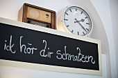 A blackboard in the 'Kapstachelbeere' pâtisserie, Berlin, Germany