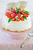 Strawberry pavlova on a cake stand